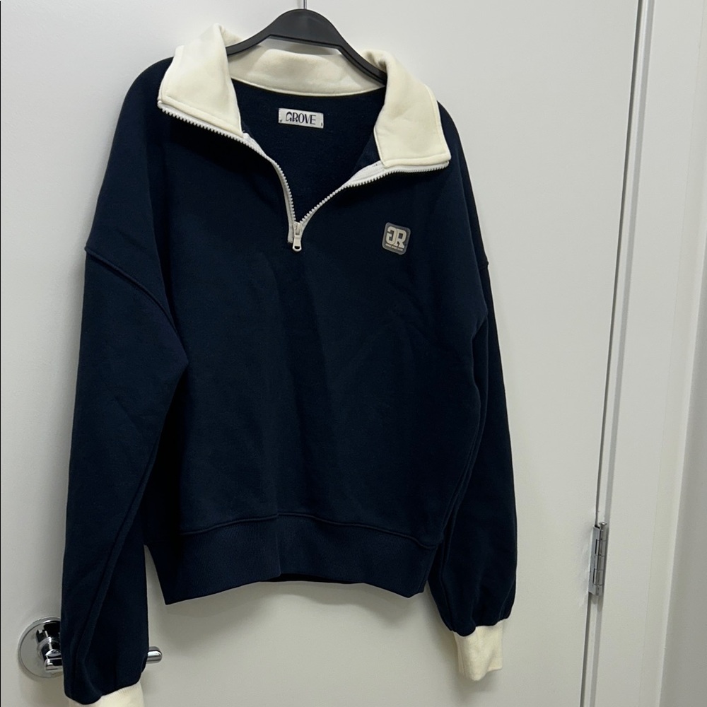 Groove Zip-Up Sweater in Black and Cream
